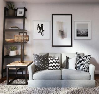 sillon gris salon  cojines estanteria